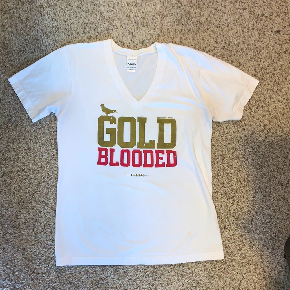 Adapt WOMAN’S v neck gold blooded top